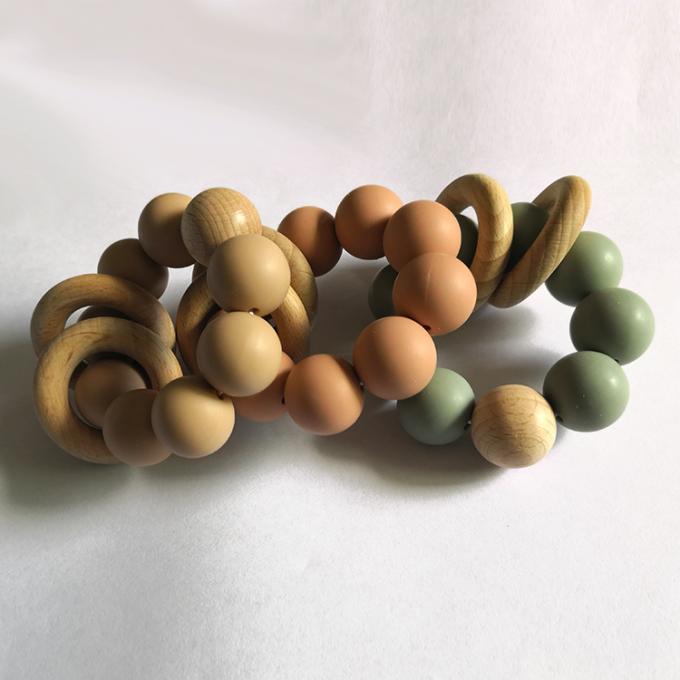 2木のブレスレットが付いている注文のシリコーンのビードのおもちゃのシリコーンの赤ん坊のteether